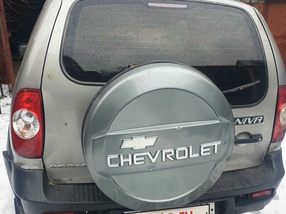 2012 Chevrolet Niva I Рестайлинг, серебристый, 480000 рублей - вид 2