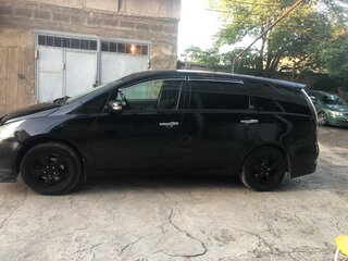 2003 Mitsubishi Grandis I, чёрный, 720000 рублей, вид 3