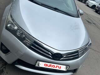 2013 Toyota Corolla XI (E160, E170, E180), серебристый, 900000 рублей, вид 3