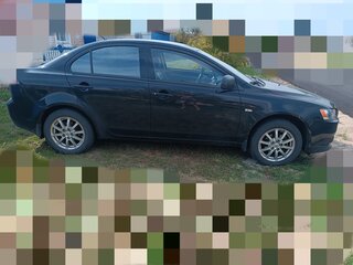 2011 Mitsubishi Lancer X Рестайлинг, чёрный, 700000 рублей, вид 2