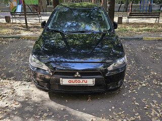 2010 Mitsubishi Lancer X, чёрный, 900000 рублей, вид 3
