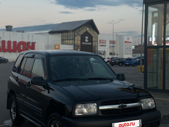 1999 Chevrolet Tracker II, чёрный - вид 1