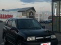 1999 Chevrolet Tracker II, чёрный - вид 1