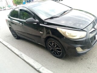 2011 Hyundai Solaris I, чёрный, 590000 рублей, вид 1