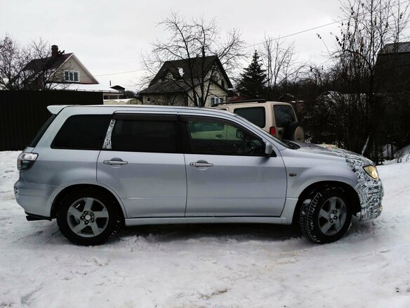 2003 Mitsubishi Airtrek I, серебристый - вид 9