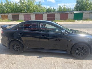 2011 Mitsubishi Lancer X Рестайлинг, чёрный, 600000 рублей, вид 5