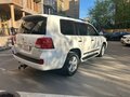 2014 Toyota Land Cruiser 200 Series Рестайлинг 1, белый, 3900000 рублей - вид 3
