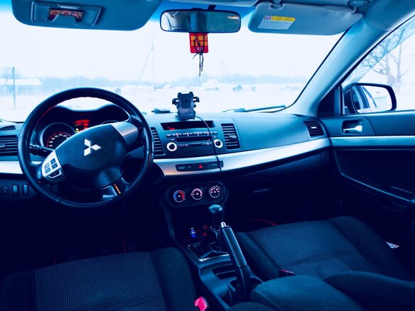 2007 Mitsubishi Lancer X, красный - вид 12