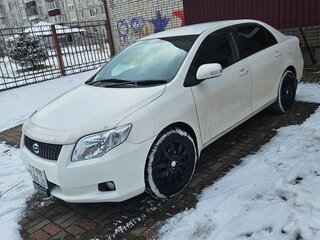 2007 Toyota Corolla Axio X (E140, E150), белый, 810000 рублей, вид 1