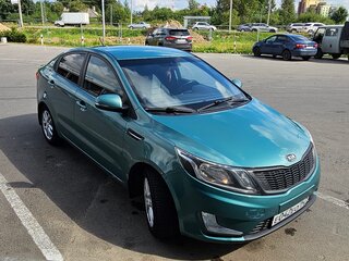 2011 Kia Rio 5-speed III, зелёный, 750000 рублей, вид 5