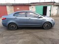 2013 Kia Rio III, голубой - вид 3