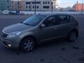 2010 Renault Sandero I, бежевый - вид 2