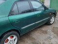 1998 Mazda 626 V (GF), зелёный, 250000 рублей - вид 2