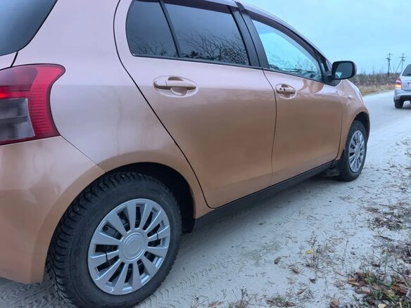 2005 Toyota Vitz II (XP90), оранжевый, 510000 рублей - вид 7