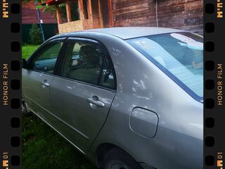 2001 Toyota Corolla IX (E120, E130), серый, 600000 рублей, вид 2