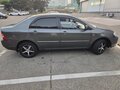 2004 Toyota Corolla IX (E120, E130), серый, 450000 рублей - вид 2