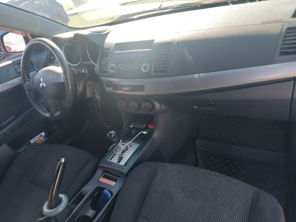 2011 Mitsubishi Lancer X Рестайлинг, красный, 650000 рублей - вид 9