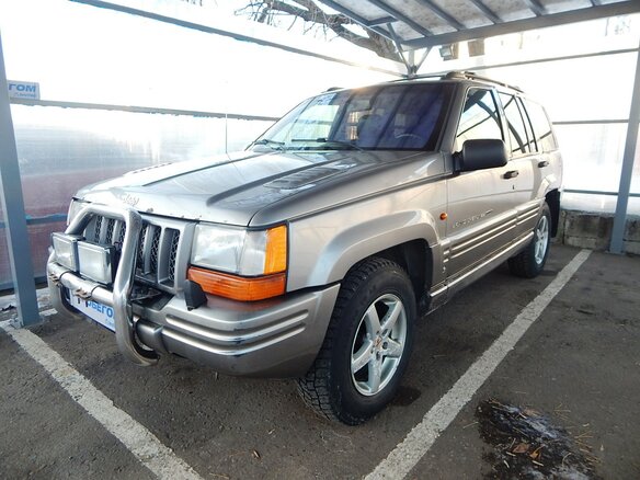 1998 Jeep Grand Cherokee I (ZJ) Рестайлинг, серый - вид 1
