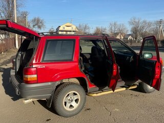 1996 Jeep Grand Cherokee I (ZJ) Рестайлинг, красный, 630000 рублей, вид 3