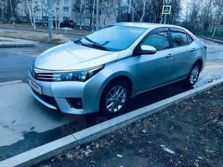 2014 Toyota Corolla XI (E160, E170, E180), серебристый, 1200000 рублей, вид 2