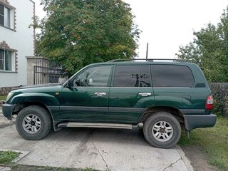 2005 Toyota Land Cruiser 105 100 Series Рестайлинг 1, зелёный, 6000000 рублей, вид 2