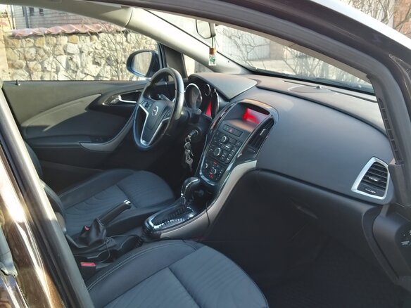 2013 Opel Astra J Рестайлинг, коричневый, 828000 рублей - вид 13