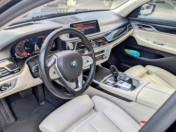 2019 BMW 7 серии 750i xDrive VI (G11/G12) Рестайлинг, чёрный, 6400000 рублей - вид 7