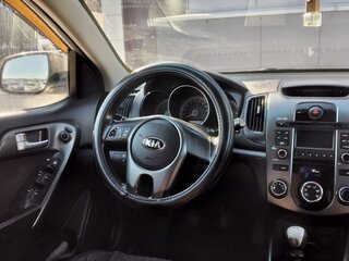 2011 Kia Cerato 5-speed II, белый, 890000 рублей, вид 4