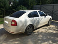 2011 Skoda Octavia II (A5) Рестайлинг, белый - вид 1