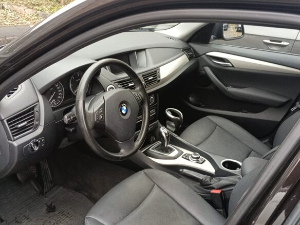 2014 BMW X1 20d I (E84) Рестайлинг, коричневый, 2200000 рублей - вид 6