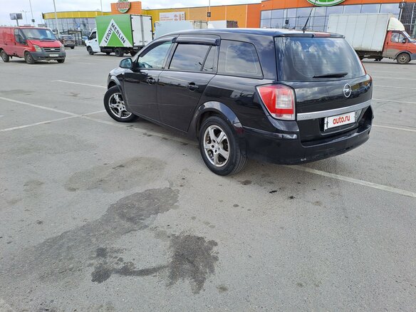 2011 Opel Astra H Рестайлинг, чёрный - вид 1