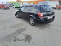 2011 Opel Astra H Рестайлинг, чёрный - вид 1