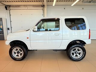 2011 Suzuki Jimny Kei car III Рестайлинг 1, белый, 1079000 рублей, вид 3