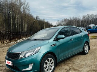 2011 Kia Rio 4-speed III, зелёный, 650000 рублей, вид 1