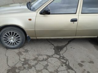 2011 Daewoo Nexia I Рестайлинг, жёлтый, 300000 рублей, вид 3
