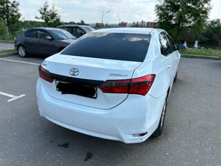 2014 Toyota Corolla XI (E160, E170, E180), белый, 950000 рублей, вид 3