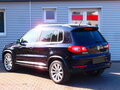 2011 Volkswagen Tiguan I, чёрный - вид 2