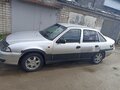 2012 Daewoo Nexia I Рестайлинг, серебристый, 130000 рублей - вид 3