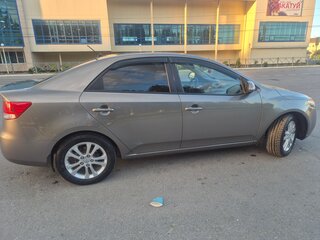 2010 Kia Cerato 5-speed II, серый, 680000 рублей, вид 2