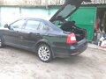 2013 Skoda Octavia II (A5) Рестайлинг, чёрный - вид 2