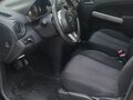 2012 Mazda 2 II Рестайлинг (DE2), чёрный, 820000 рублей - вид 7