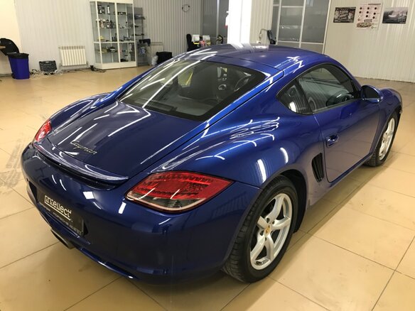 2009 Porsche Cayman I (987) Рестайлинг, синий - вид 3