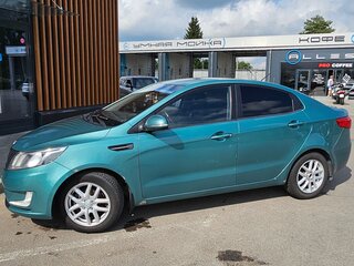 2011 Kia Rio 5-speed III, зелёный, 750000 рублей, вид 2