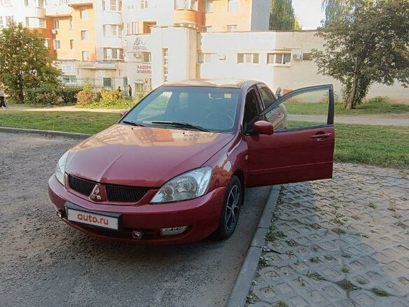2006 Mitsubishi Lancer IX Рестайлинг, красный, 750000 рублей - вид 1