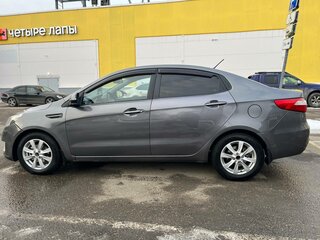 2014 Kia Rio 5-speed III, серый, 750000 рублей, вид 5