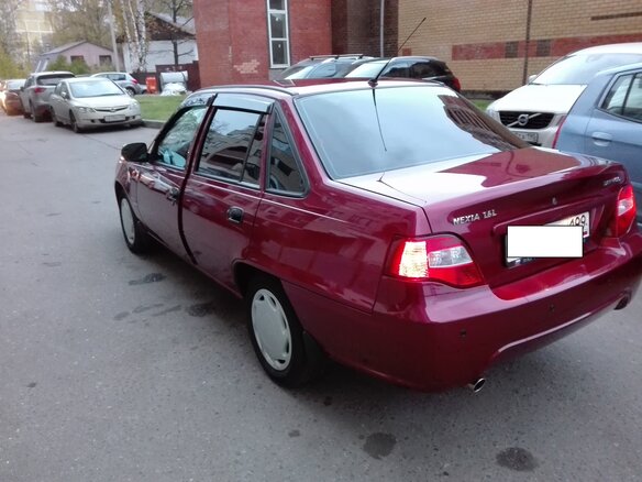 2009 Daewoo Nexia I Рестайлинг, красный