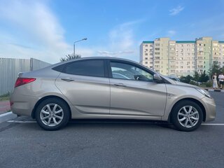 2011 Hyundai Solaris I, коричневый, 780000 рублей, вид 4
