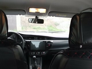 2013 Toyota Corolla XI (E160, E170, E180), белый, 1720000 рублей, вид 3