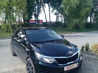 2015 Kia Rio III Рестайлинг, чёрный, 599900 рублей, вид 1