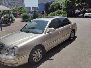 2004 Kia Opirus I, бежевый, 650000 рублей, вид 4